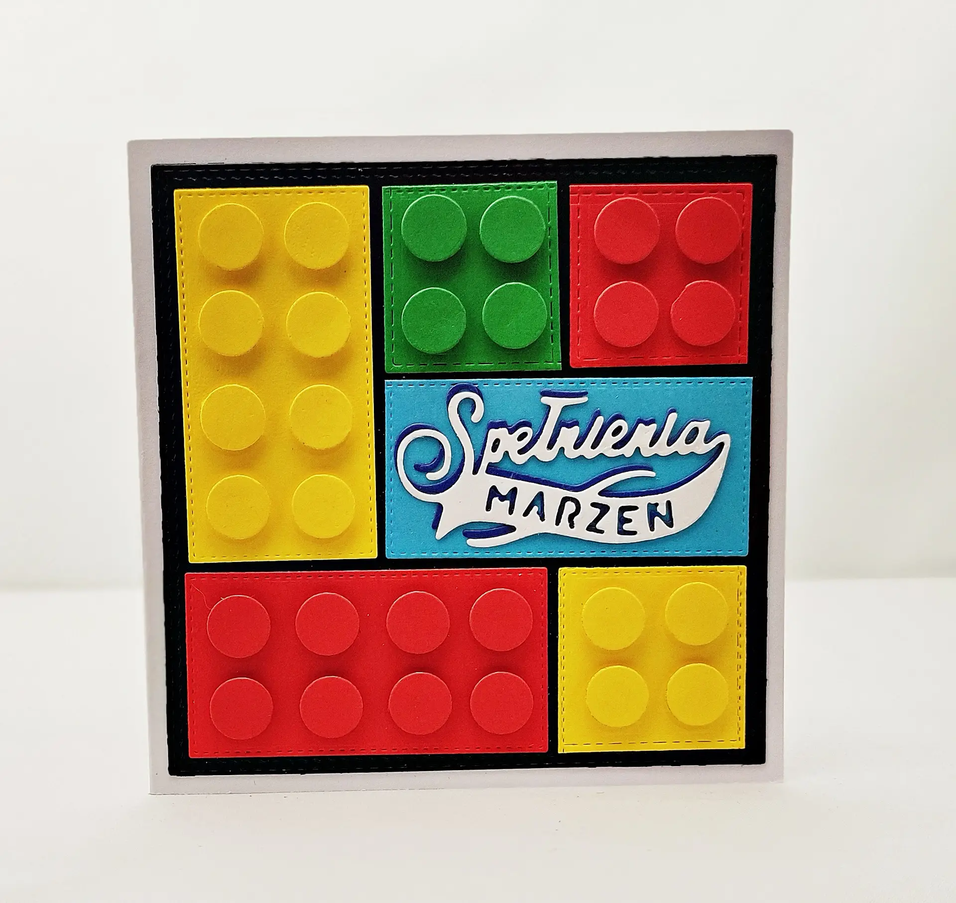 ręcznie robiona kartka z kolorowymi klockami lego z napisem "Spełnienia marzeń", idealna na urodziny i imieniny, z kopertą i foliówką